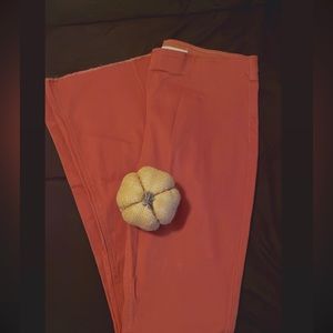 High waisted and flared burnt orange pants